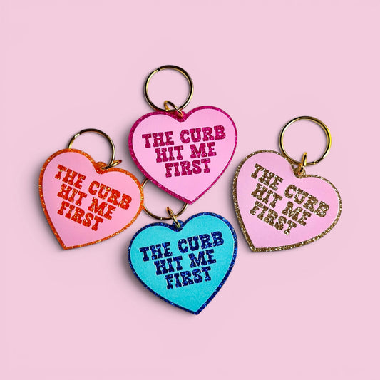 The Curb Hit Me First Keychain